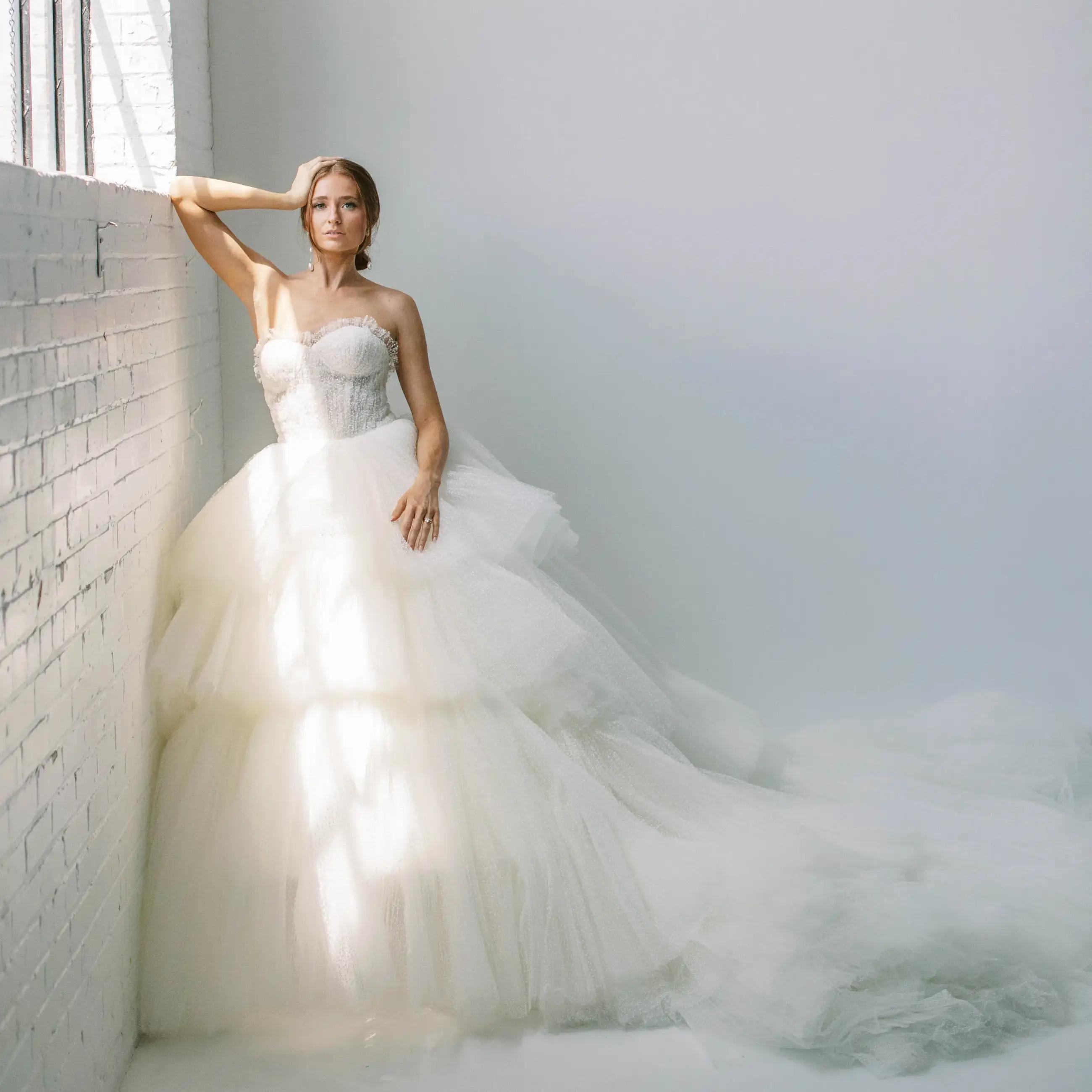 Ballgown or Mermaid? How to Pick Your Bridal Silhouette. Mobile Image